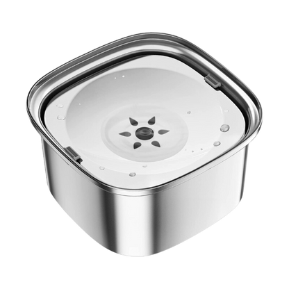 Stainless steel Zero Splash dog bowl with transparent floating plate and water.