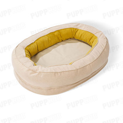 Cozy beige oval dog bed with yellow interior for ultimate pet comfort