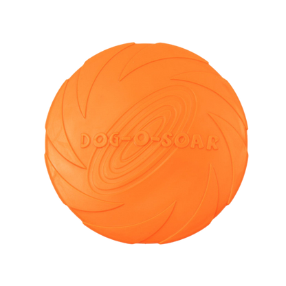 Orange Rubber Pupp Frisbee with spiral pattern and 'DOG-O-SOAR' text for dogs.