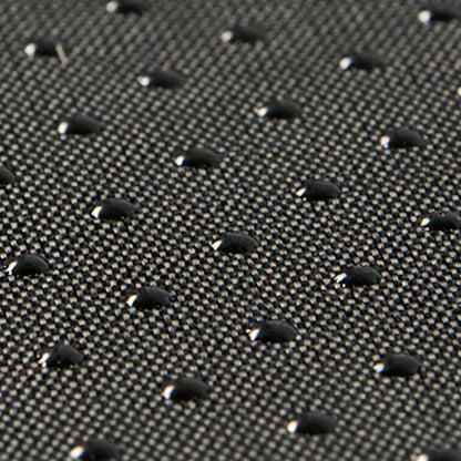 Water-resistant black fabric close-up, ideal for PlushPupp beds and durability.